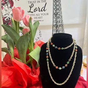 Gold tone necklace with colored stones